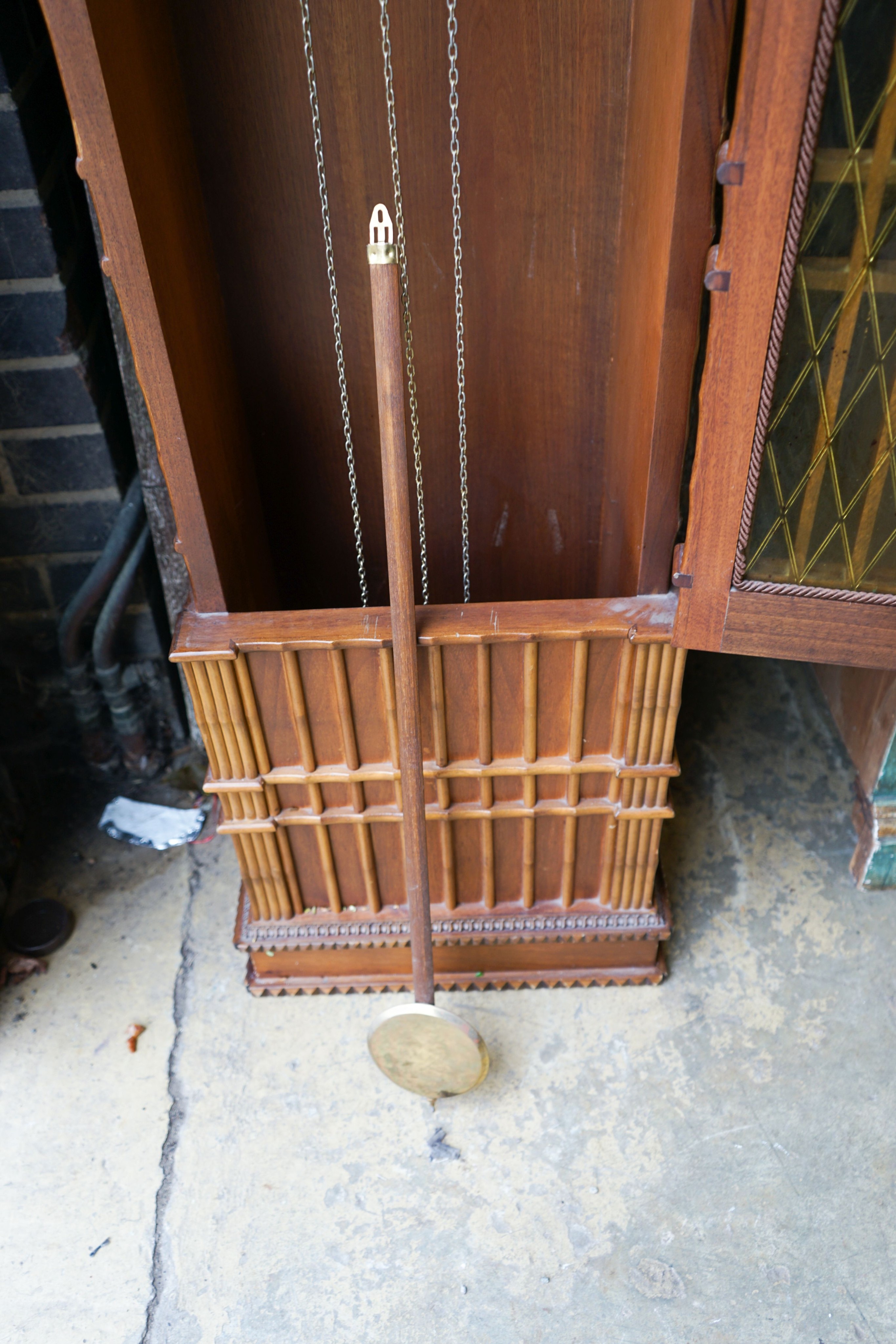 A mid 20th century architectural longcase clock, dial marked, 'Urgos', height 248cm